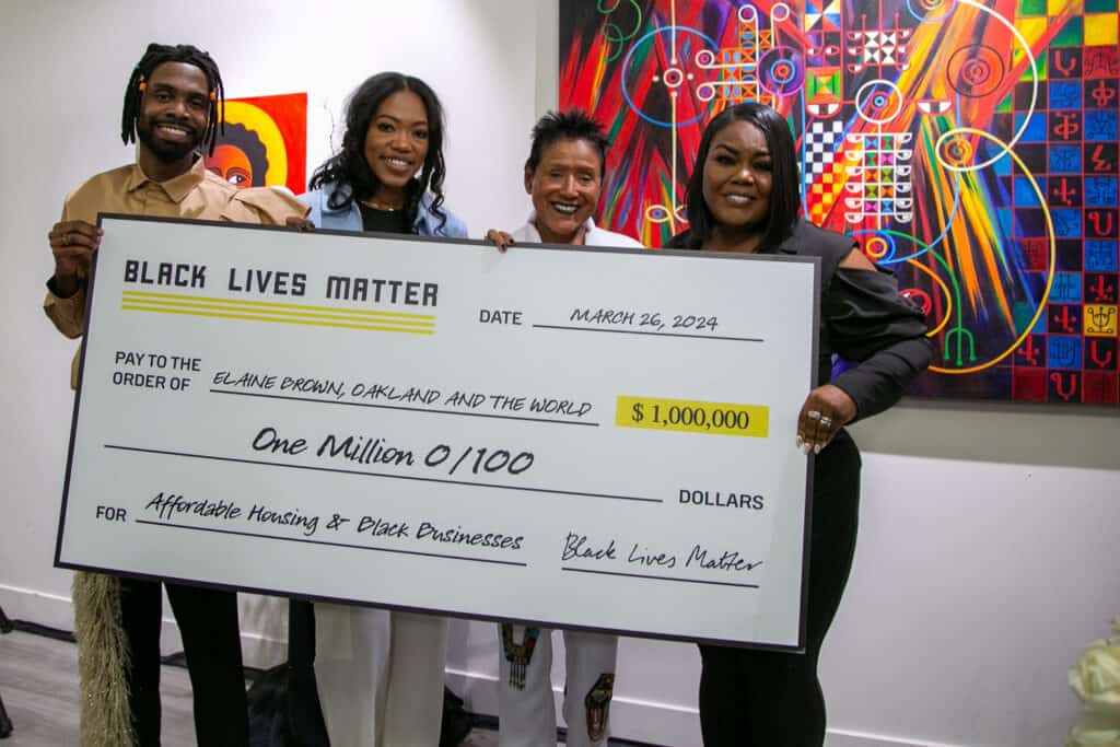 Black Lives Matter presented former Black Panther Chairwoman Elaine Brown with $1 million to fund the Black Panther building in West Oakland and the Black-owned businesses that will make it thrive!